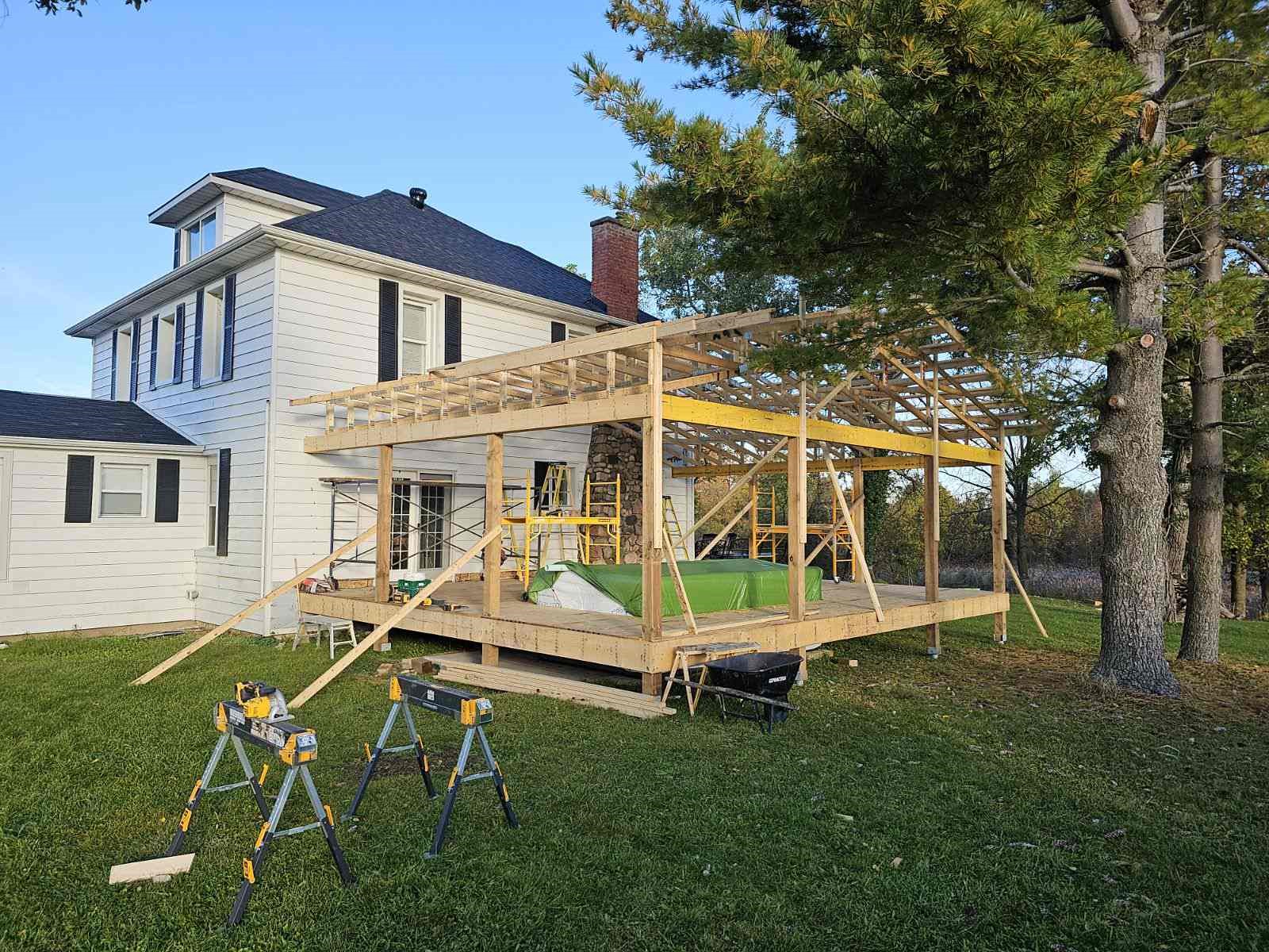 Vendor-supplied example of a covered porch structure supported on helical piles